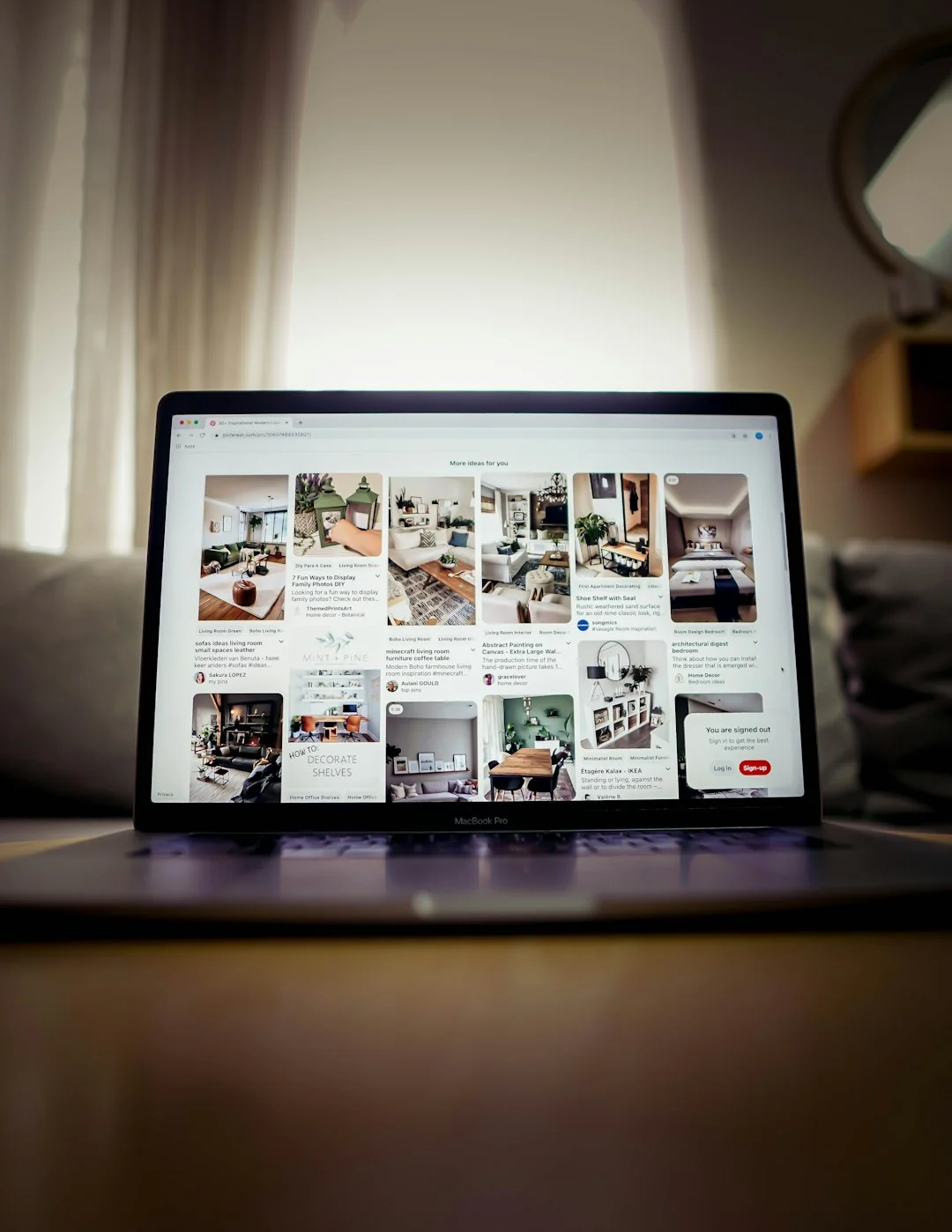 A contemporary workspace showcasing a laptop, tablet, and smartphones, ideal for tech and freelance use.